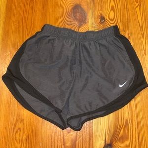 Dark gray and black dri-fit Nike shorts